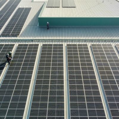 Solar,Panels,Installed,On,A,Roof,Of,A,Large,Industrial