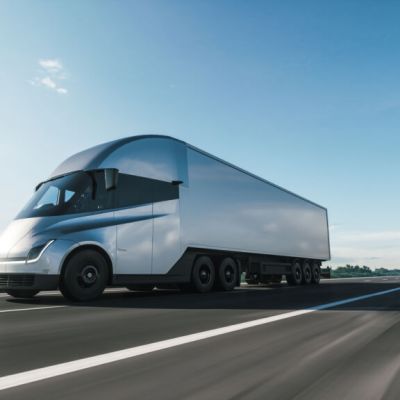 Semi-truck,With,Cargo,Trailer,Moving,On,A,Highway.,Modern,Cargo